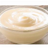 Extra Frosting · 2 oz. Side of cream cheese frosting.