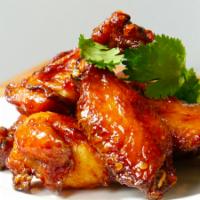 Honey Hot Wings · Medium hot honey hot wings. Classic-style bone-in wings.