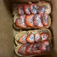Peanut Butter Strawberry Toast · Peanut butter, strawberries, chia seeds on multigrain toast