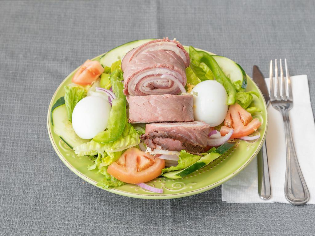 48. Chef Salad · Romaine lettuce, tomato, cucumber, onions, peppers, turkey, roast beef, ham, Swiss  cheese and hard boiled egg.