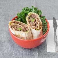 55. The Philly Wrap · Philly Cheese Steak, Grilled Onions, Peppers & Mushrooms