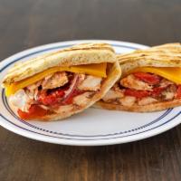 93. Chicken Fajita Panini · Grilled chicken, cheddar cheese, roasted peppers, onions and fajita salsa sauce.