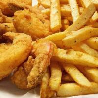 Shrimp ＆ Fries · Six seasoned fresh jumbo shrimp battered deep fried to a golden perfection with a salad and ...