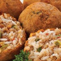 Boudin Balls · Four deep fried golden and served with plush dipping sauce.