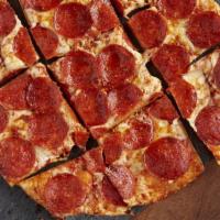 Traditional Pepperoni Pizza · Thin crust pizza loaded with pepperoni, cheese and signature sauce. Add any topping for 2 mo...