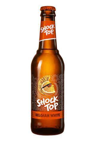 Shock Top Belgian White · Must be 21 to purchase. This spiced Belgian-style wheat ale is the pinnacle of refreshment brewed with real orange, lemon and lime peels for a smooth, citrusy finish. The beer that’s always down to chill — and be chilled. 
