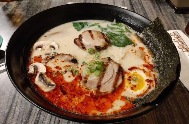 R4. Shio Ramen · Ramen noodle with chashu roasted pork, spinach, mushrooms, egg, bamboo shoots, green onions, nori, sesame seeds, bean sprouts and yuzu sauce, in a naturally salty clam broth.
