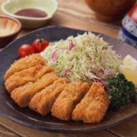 F7. Ton Katsu · Tender pork, breaded and deep fried, served with tonkatsu sauce.