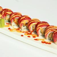 H13. Red Dragon Roll · Crispy shrimp tempura with fresh tuna, avocado and cucumber, topped with spicy sauce.