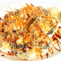 H15. Super Dynamite Roll · Tempura-fried spicy tuna roll with scallions, tobiko, avocado and cucumber, spicy sauce and ...