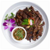 Crying Tiger · Thai style grilled rib eye steak served with homemade sauce “jeaw”.