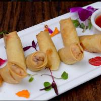 Egg Roll · Fried veggies egg rolls. Served with sweet n’ chili sauce.