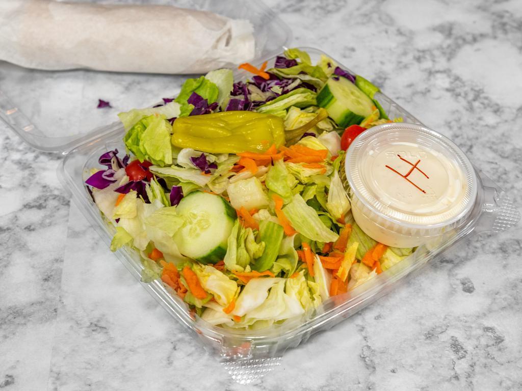 Garden Salad · Lettuce, tomatoes, Kalamata olive, cucumber, carrots, red cabbage pepperoncino.