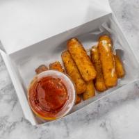 Mozzarella Sticks · 8 pieces. Mozzarella cheese that has been coated and fried.