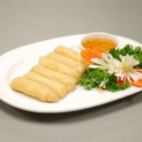 Egg Rolls · Mixed vegetables in egg roll skin. Served with sweet and sour sauce. 