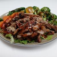 Teriyaki Chicken · Grilled dark meat chicken and topped with teriyaki sauce & sesame seeds served with steamed ...