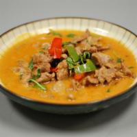 Panang Curry · Thick mixed coconut milk & red curry, bell pepper, and basil. Come with rice. Spicy.