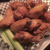 Buffalo Wings  · Our Buffalo style wings, tossed in any 1 of our signature sauces.