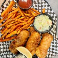 Black and Tan Fish-n-Chip Basket · Alaskan cod light fried in 4 Peaks 8th Street Ale  and Guinness Draught beer batter, french ...