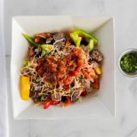 Fajita Steak Bowl · Tenderloin, converted rice, black beans, bell peppers, cheese, pico de gallo.