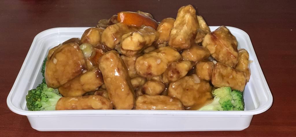Vegetarian Orange Chicken · Vegetarian chicken tossed in a sweet and spicy orange sauce. Served with choice of white rice, fried rice or lo mein. Spicy. Vegetarian.