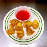 7 Piece Fired Meat Wontons炸云吞 · Chinese dumpling that comes with filling.