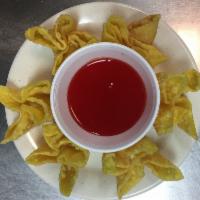6 Piece Cream Cheese Wontons 芝士云吞 · Chinese dumpling that comes with filling.