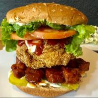 Proud Mary · She’s proudly stacked! proud features smoky BBQ tofu and crispy tofu, pickles, ketchup, lett...