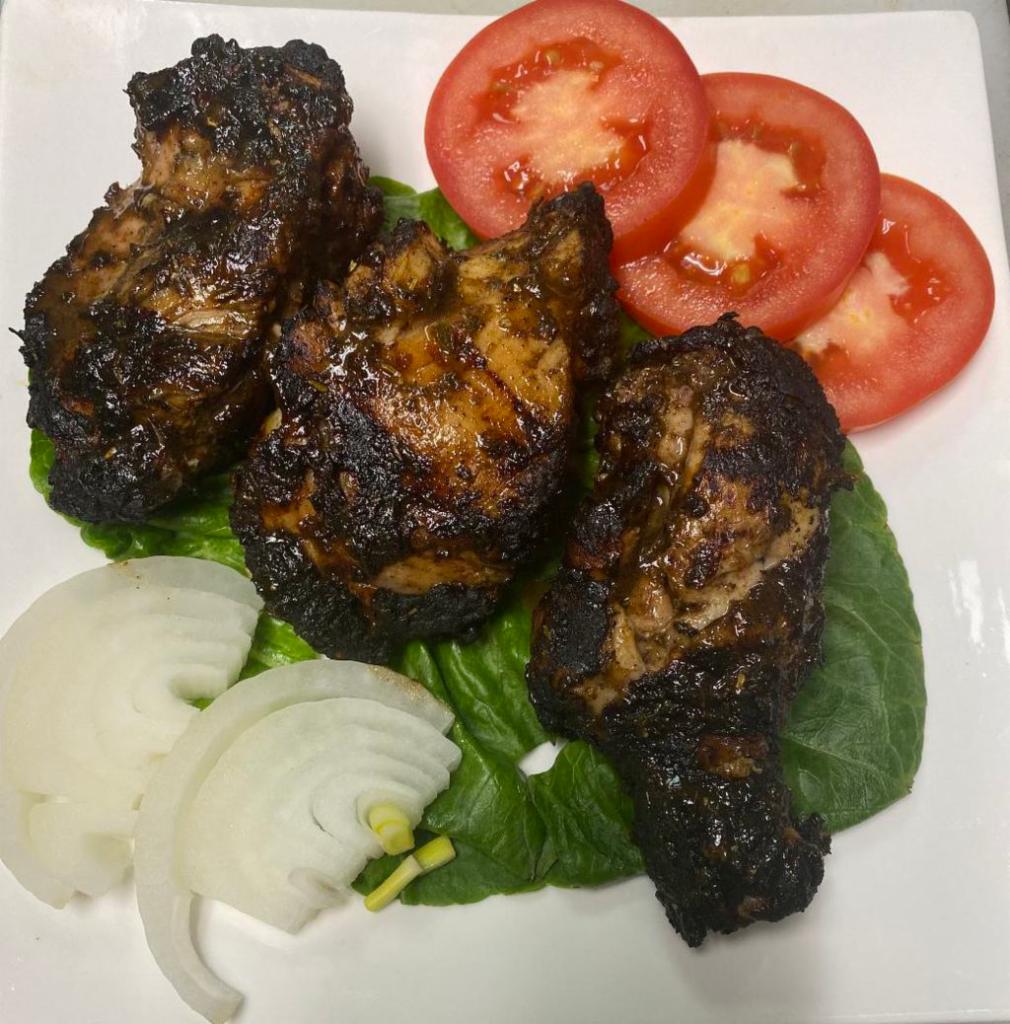 Grilled Jerk Chicken · Halal. Comes with fries (2 leg quarters).