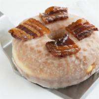 Maple and Bacon Donut · Brioche donut with maple pastry cream filing and candy bacon.