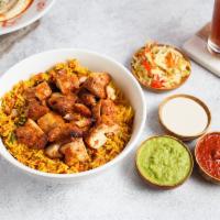 Rice Bowl with Chicken (GF) by Oren's Hummus · By Oren's Hummus. Turmeric spiced Basmati rice simmered with tomatoes, garlic, onions, mint,...