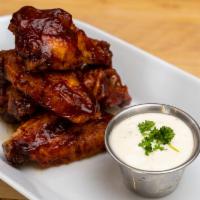 BBQ Wings · Wings tossed with sugar-free BBQ Sauce and served with Ranch dressing
