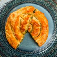 Spinach Homemade Phyllo Pie · Made with spinach, white onions, feta cheese and herbs.