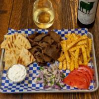 Lamb and Beef Platter · Lamb and Beef ground up together with herbs and spices, Pita Bread, Small Greek Salad, Fries...