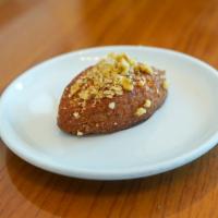 Melomakarono · Vegan Cookie dipped in Honey and topped with Walnuts