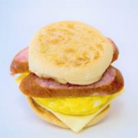 English Muffin Breakfast Sandwich · A toasted English muffin with scrambled egg, white cheese and choice of meat.