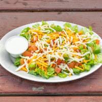 Veggie Salad · Tomato, onion, bell peppers, celery and carrots with your choice of dressing.