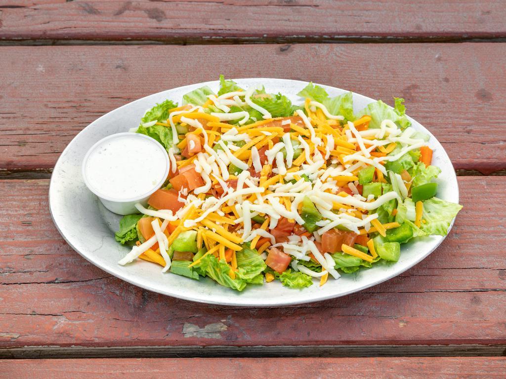 Veggie Salad · Tomato, onion, bell peppers, celery and carrots with your choice of dressing.