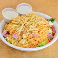 Chef Salad · For those who love the classics. Mixed lettuce greens, onion, green peppers and tomatoes top...