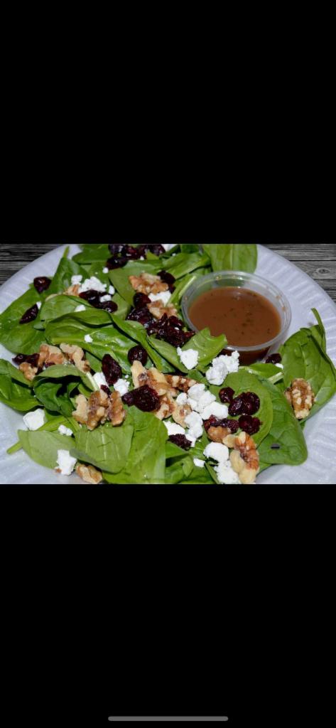 Goat Cheese Salad · Baby spinach, goat cheese, nuts, dried cranberries, and balsamic vinaigrette. Served with pita bread.