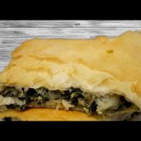 Mama's Spanakopita Small Plate · A healthy stuffing of fresh spinach and feta between layers of crispy filo dough.