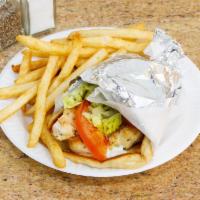 Chicken Gyros · Grilled chicken served on fluffy pita bread with lettuce, tomatoes, onions, and house tzatzi...