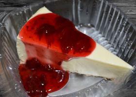 Strawberry Cheesecake · Creamy smooth cheesecake topped with strawberry sauce.