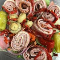 Antipasto Salad · Garden salad, topped with red onions, cheery tomatoes, green peppers, cucumbers, Italian col...