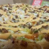 Town Burger Pizza · White pizza, hamburger, tomatoes, pickles, onions, special sauce and mozzarella cheese.