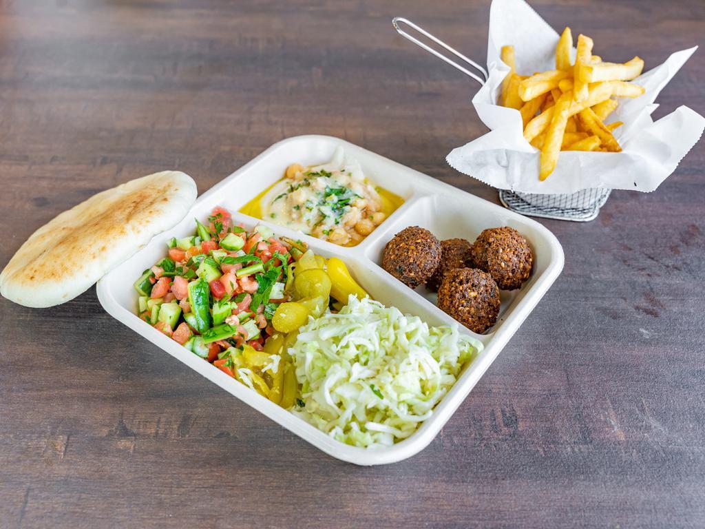 Falafel Plate · 4 fresh falafel balls, hummus, Israeli chopped salad, cabbage and pickles. served with freshy baked pita bread and french fries.
