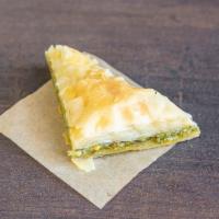 Baklava · Flaky buttery dough filled with nuts and soaked with honey! perfectly pairs with coffee
