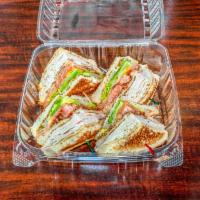 Country Club Panini Sandwich Lunch  · Ham and turkey, lettuce, sundried tomatoes, avocado, American cheese, and mayo.
