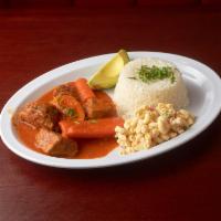 Gulso de Carne · Beef stew. Acompanado con arroz y ensalada. Served with rice and salad.