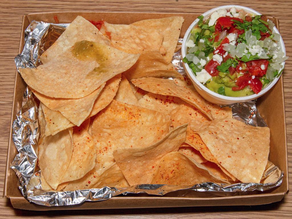 Chips and Guacamole · Fresh made daily guacamole. Substitute grain free chips for an additional charge.
